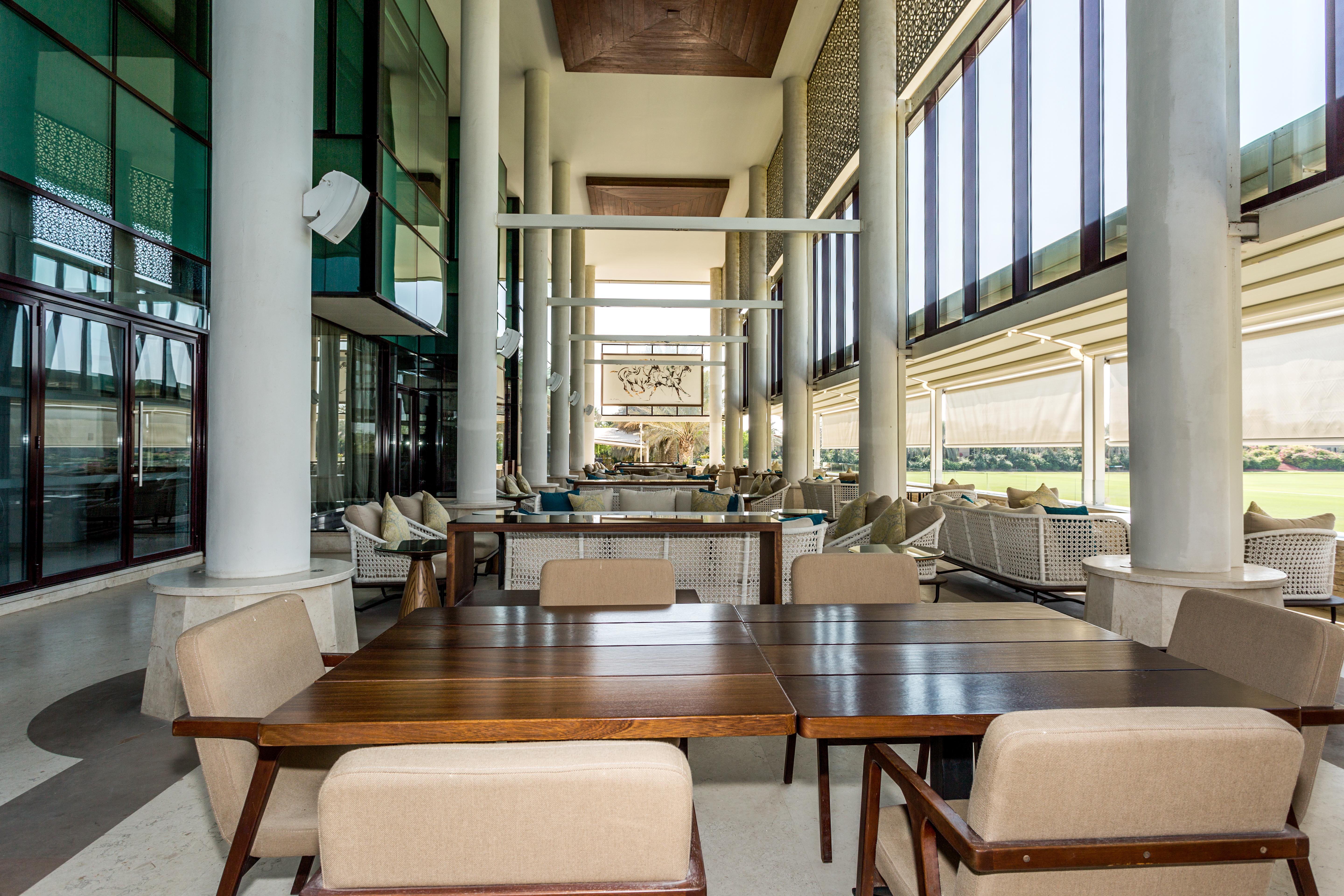 Melia Desert Palm Member Of Melia Collection Dubai Buitenkant foto The interior of the clubhouse at the Abu Dhabi Golf Course
