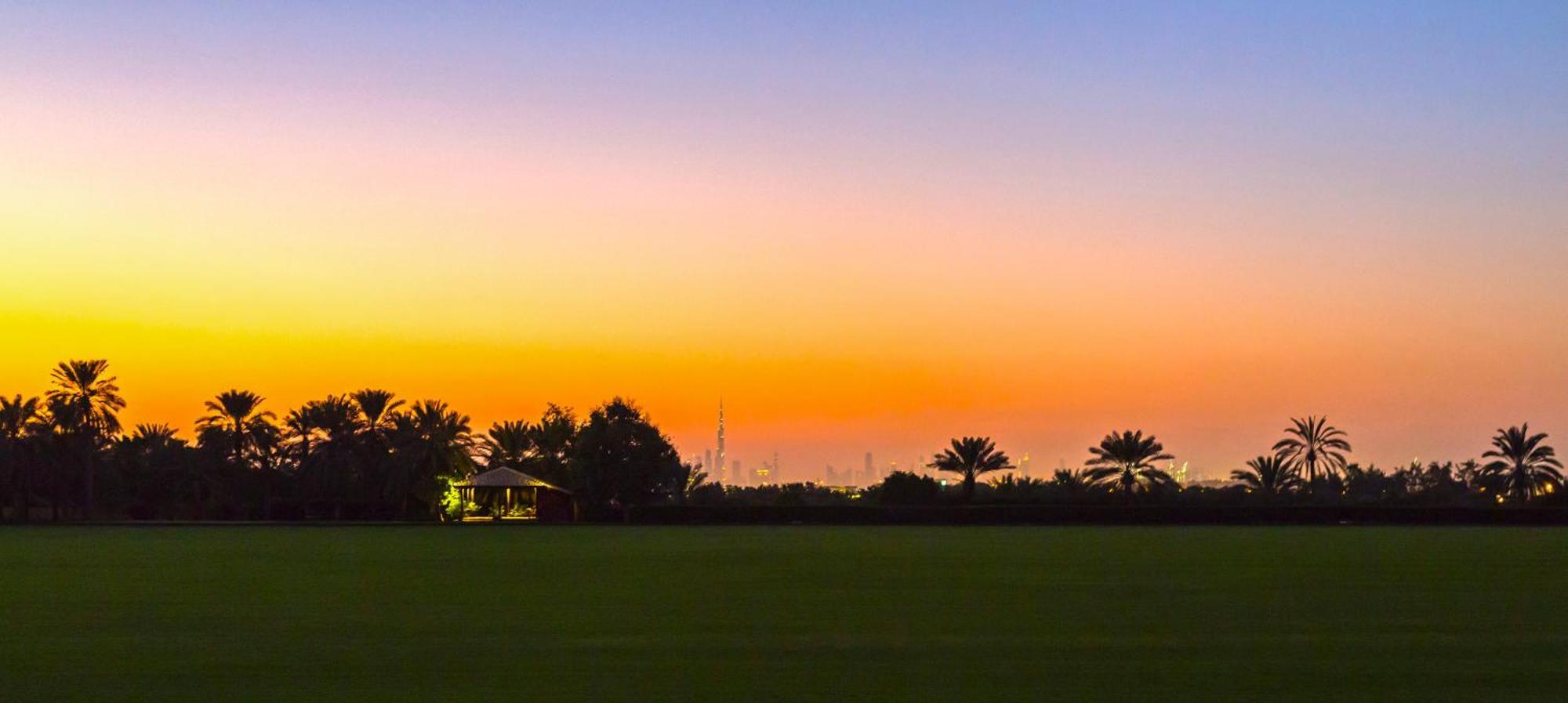 Melia Desert Palm Member Of Melia Collection Dubai Buitenkant foto Sunset over Al-Qusais